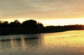 A marker by sunset