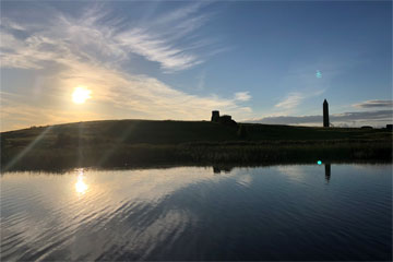 The sun setting on Holy Island on Lough Erne