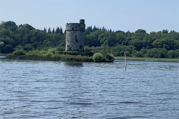 Shannon Boat Hire Gallery - Passing a round tower on Lough Erne