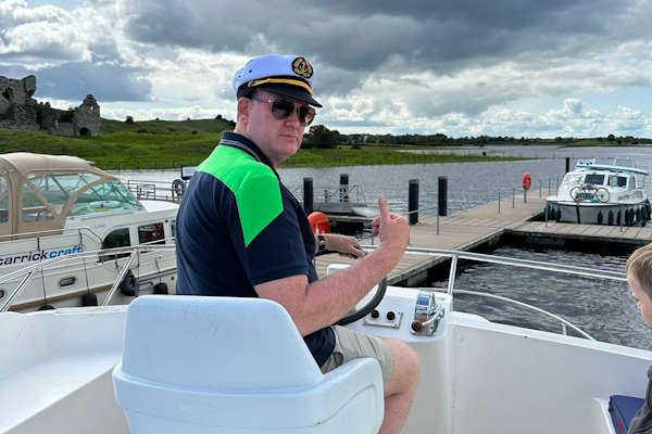 Shannon Boat Hire Gallery - Sometimes he's allowed sit in the Captain's seat