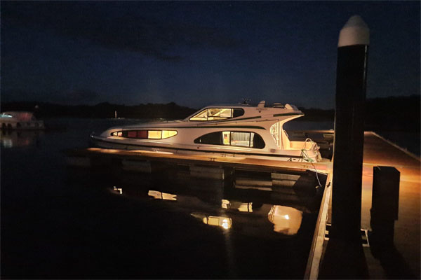 Caprice moored at night