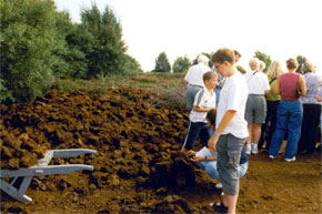 Shannon Boat Hire Gallery - Gregor Rudolph examining a peat bog near Shannonbridge.