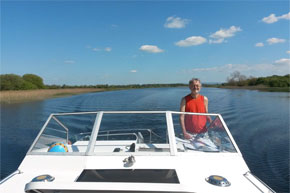 Shannon Boat Hire Gallery - Captain on the bridge!