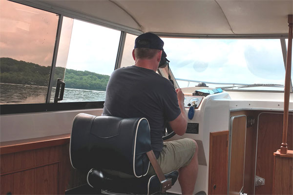 The Helm on the Noble Cadet Cruiser - Boat for Hire on the Shannon River