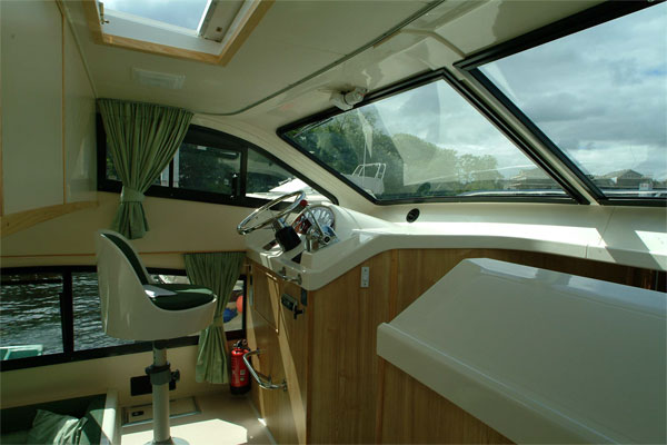 Helm on the Elegance Hire Boat.