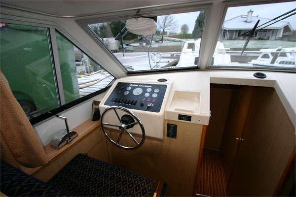 The Helm on the Fermanagh Class Cruiser - Shannon River Boat Hire Ireland