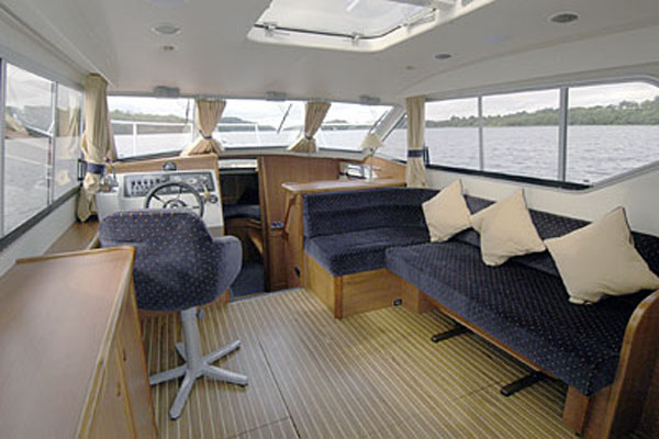 Helm and Saloon on the Inver Prince 2+2 berth hire boat