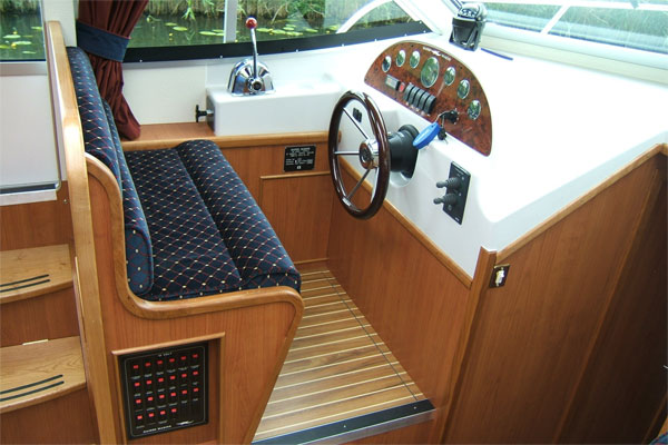 Helm on the Roscommon Class hire boat Ireland.