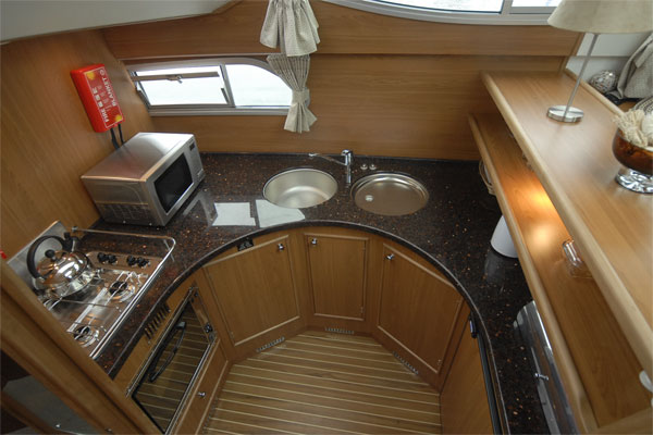 The well-equipped galley on the Silver Spirit Cruiser - Shannon River Cruises Ireland.