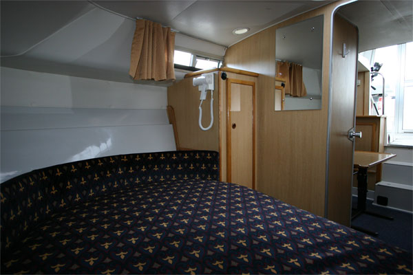 The sleeping cabin on the Tyrone Class Cruiser - Shannon River boat hire Ireland.