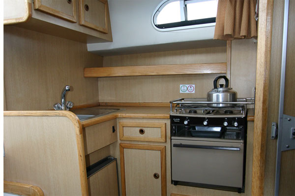 The galley on the Tyrone Class cruiser - Shannon River boat hire Ireland.