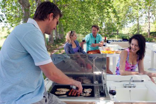 Barbecue on the Sundeck of the Vision 3 Hire Cruiser