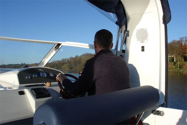 Flybridge steering on the Noble Emperor Hire Cruiser