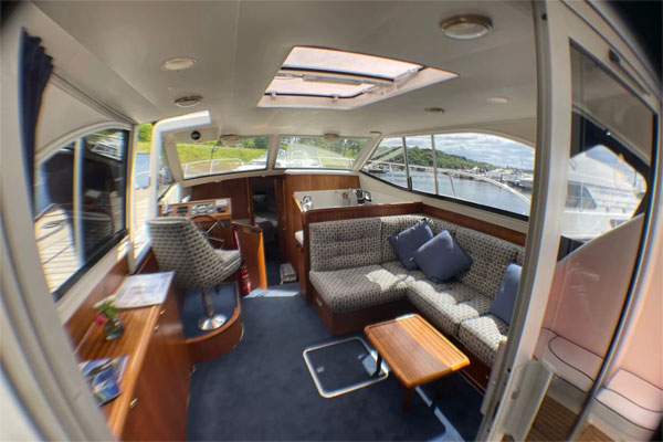 View of the saloon from the rear deck on the Noble Lady hire boat.